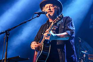 Oliver Berg/dpa | Wolfgang Niedecken gibt nächstes Jahr mit BAP ein Open-Air-Konzert im Kölner Rheinenergie-Stadion (Archivbild).