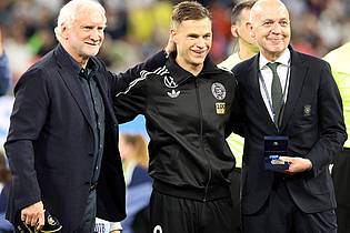 Christian Charisius/dpa | Rudi Völler (l) verlangt im Spiel um Platz drei der Nations League eine bessere Leistung des DFB-Teams.