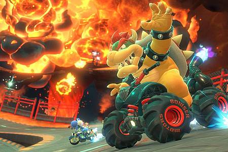 Nintendo/dpa-tmn | Feuerspeiend unterwegs: Bowser auf einem Quad in «Mario Kart World».